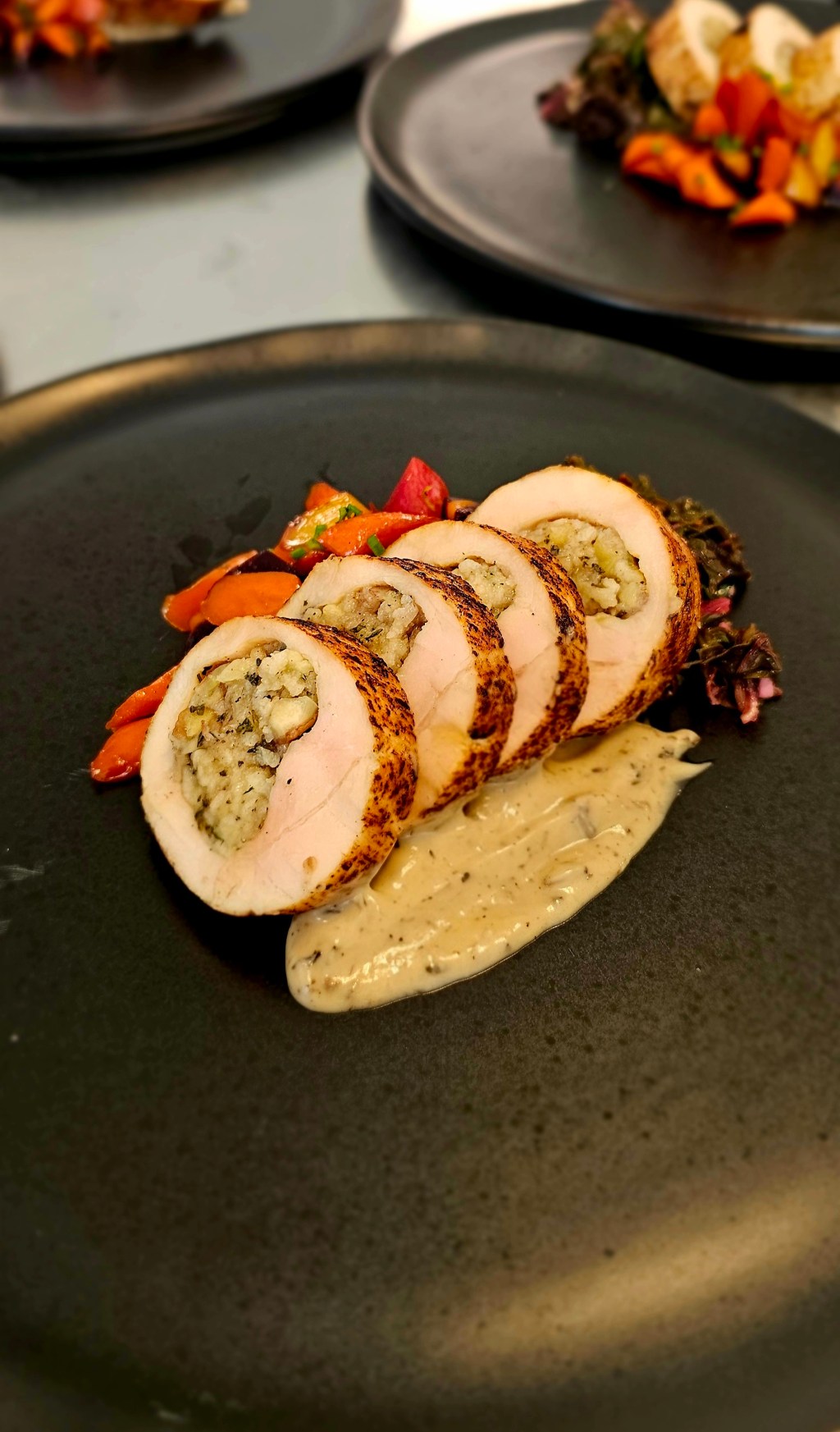 Chestnut-Stuffed Chicken Roulade with Maple-Glazed Carrots, Sautéed Swiss Chard & Morel&nbsp;Sauce